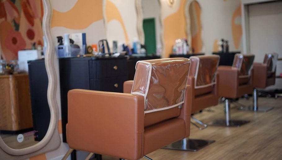 Elegant seating and mirrors at In Salon, Yellow Springs, Ohio, US.