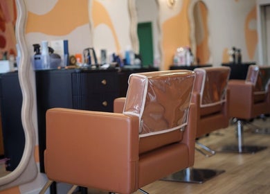 Elegant seating and mirrors at In Salon, Yellow Springs, Ohio, US.