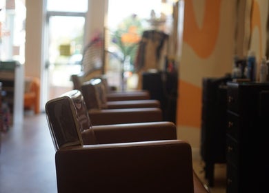 Elegant salon chairs at In Salon, Yellow Springs, Ohio, US, inviting and stylish ambiance.
