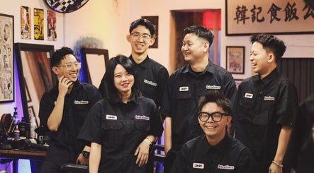 Friendly team at Sause Barbershop - Georgetown, George Town, Pulau Pinang, MY, laughing together.