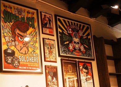 Retro-themed posters adorn the walls of Sause Barbershop - Georgetown, George Town, Pulau Pinang, MY.