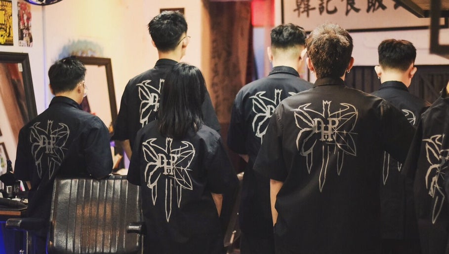 Barbers at Sause Barbershop - Georgetown wearing branded shirts in George Town, Pulau Pinang, MY.