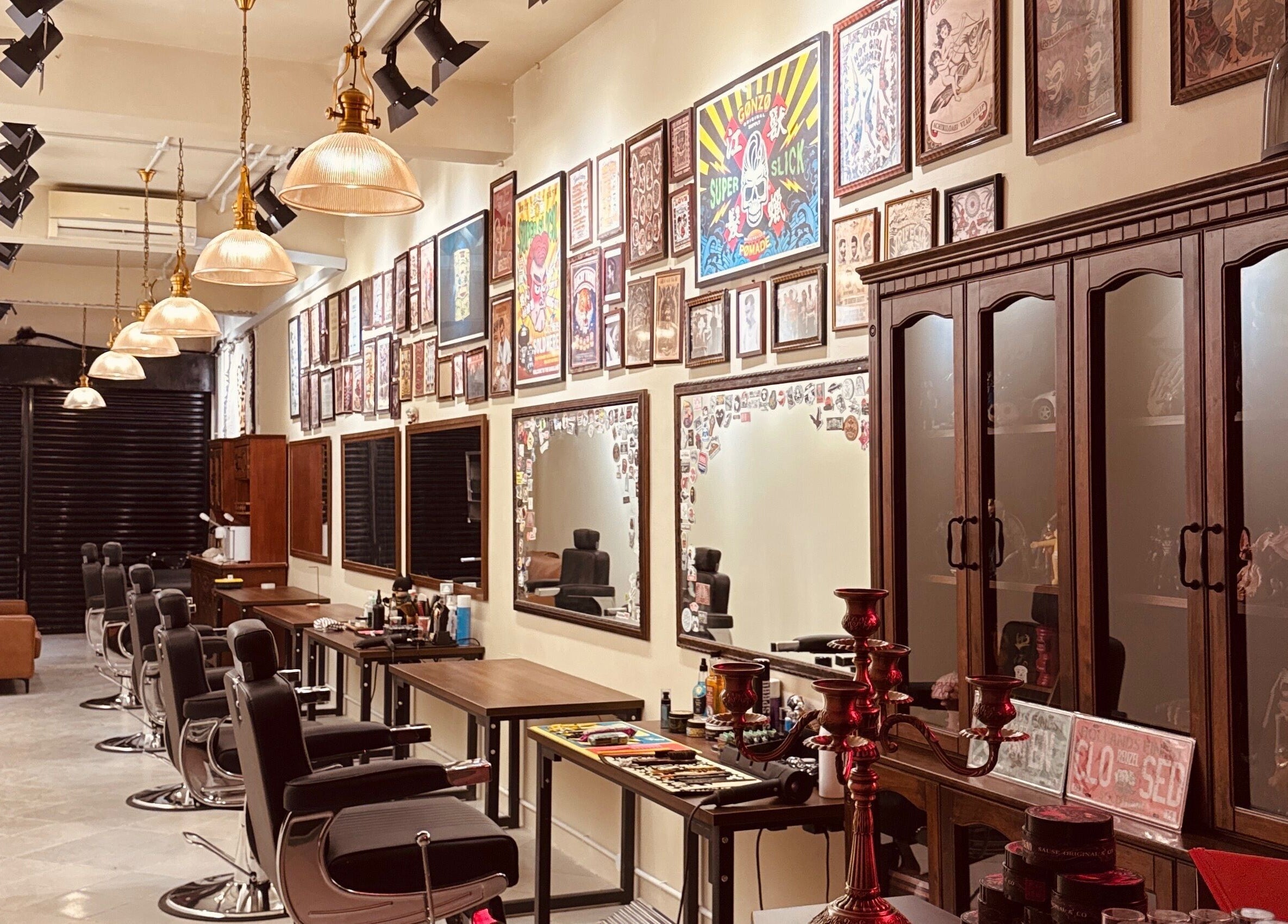 Interior of Sause Barber Cut Club -Sungai Ara in Bayan Lepas, Pulau Pinang, MY, featuring vintage decor and barber chairs.