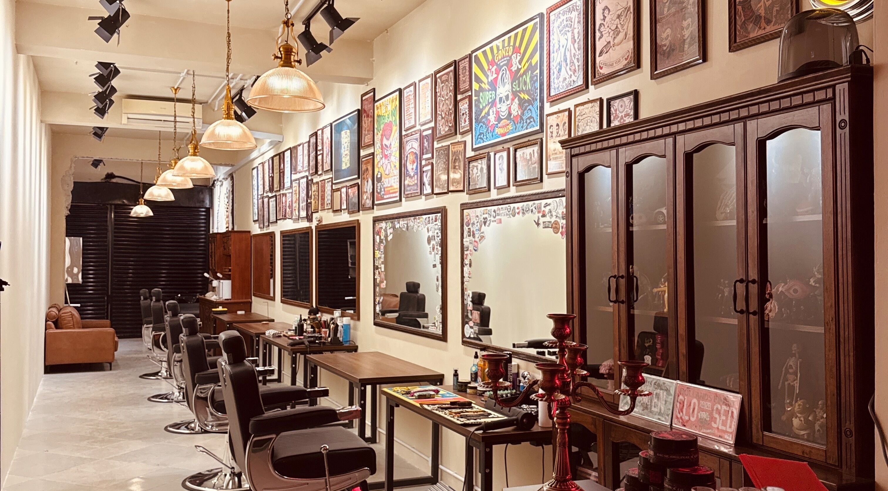 Interior of Sause Barber Cut Club -Sungai Ara in Bayan Lepas, Pulau Pinang, MY, featuring vintage decor and barber chairs.