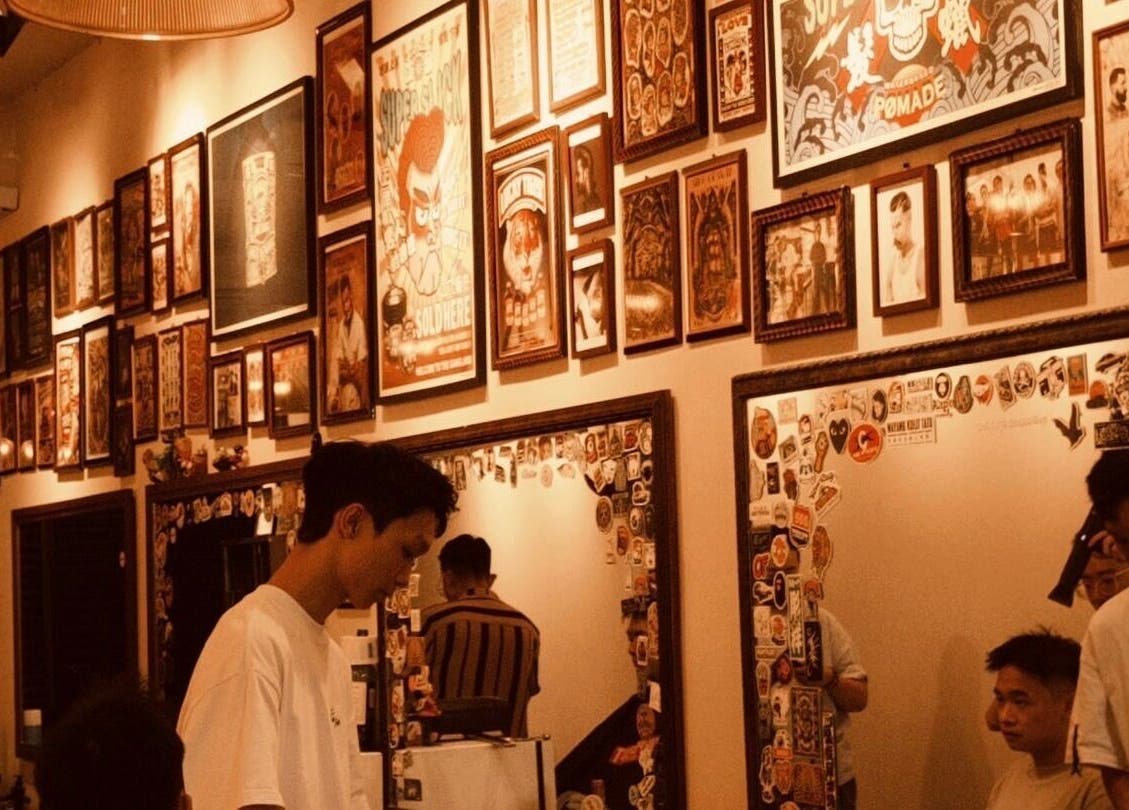 Cozy interior of Sause Barber Cut Club - Sungai Ara in Bayan Lepas, Pulau Pinang, MY, adorned with eclectic wall art.