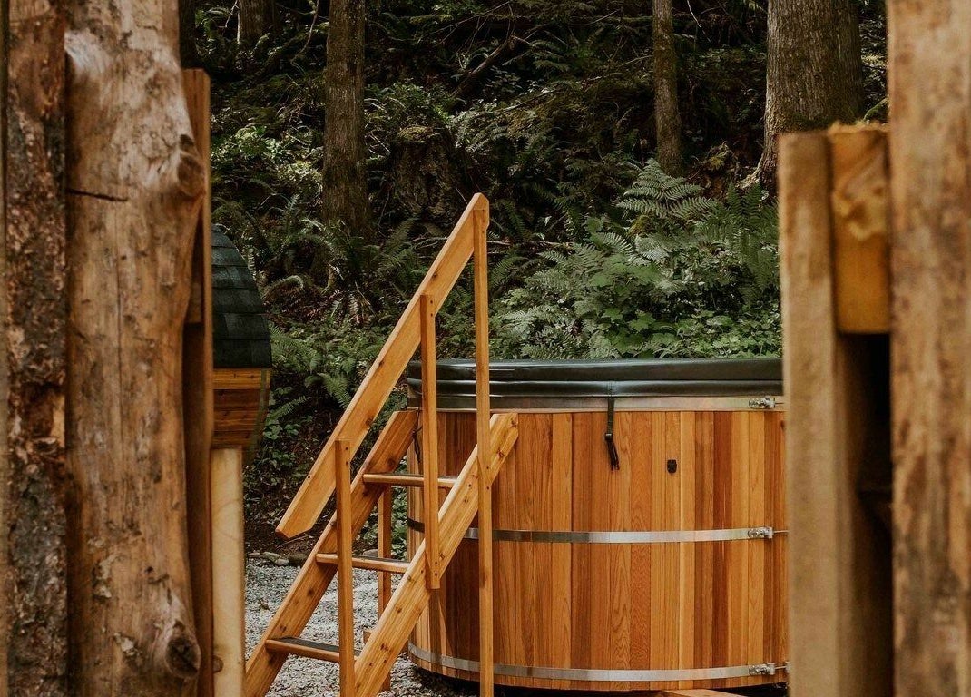 Nature-surrounded hot tub at The Moonshine Spa, Madeira Park, British Columbia, CA.