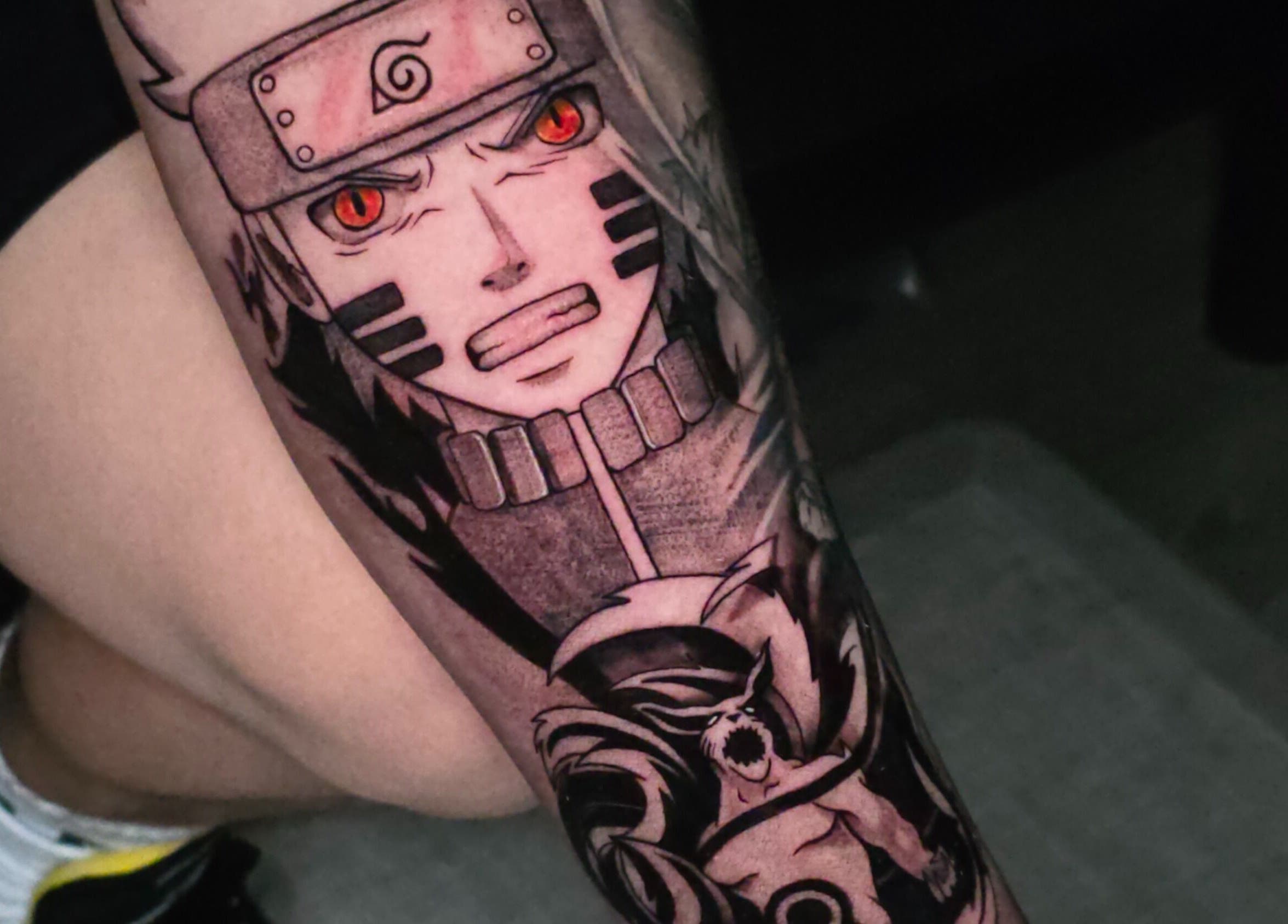 Diseño de tatuaje estilo anime en David Tattoo, Fairfax, Virginia, US, mostrando personaje detallado.