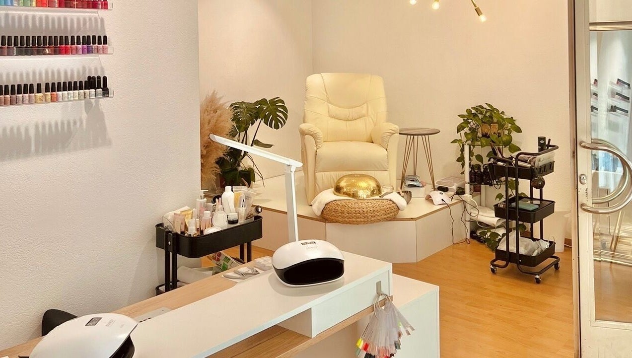 Elegant beauty room at Torico of Beauty in Basel, Basel-stadt, CH featuring a plush chair and mani-pedi tools.