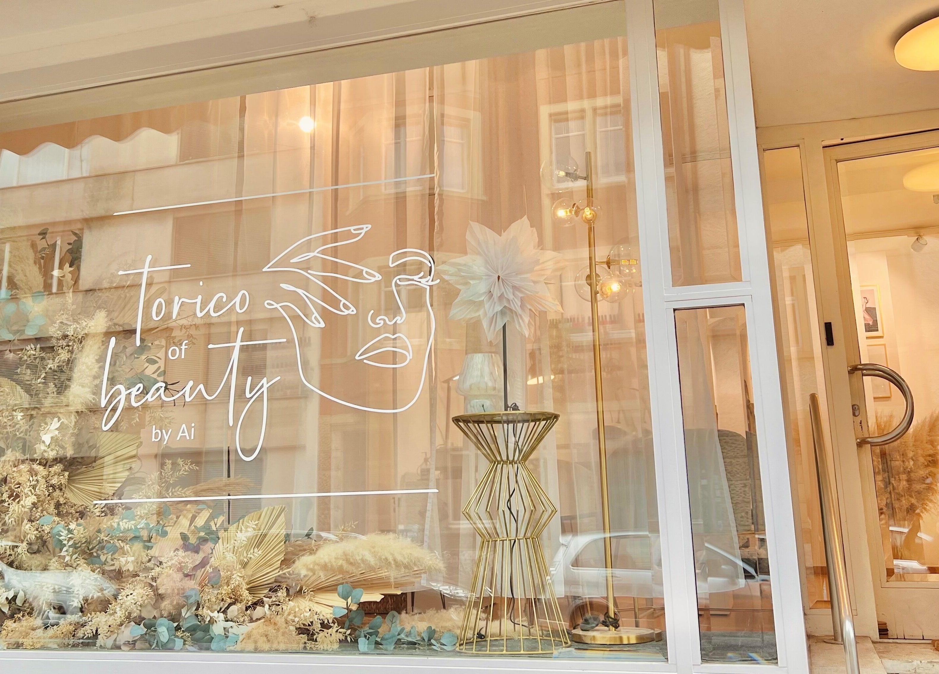 Stylish exterior of Torico of Beauty in Basel, Basel-stadt, CH showcasing a chic window display.