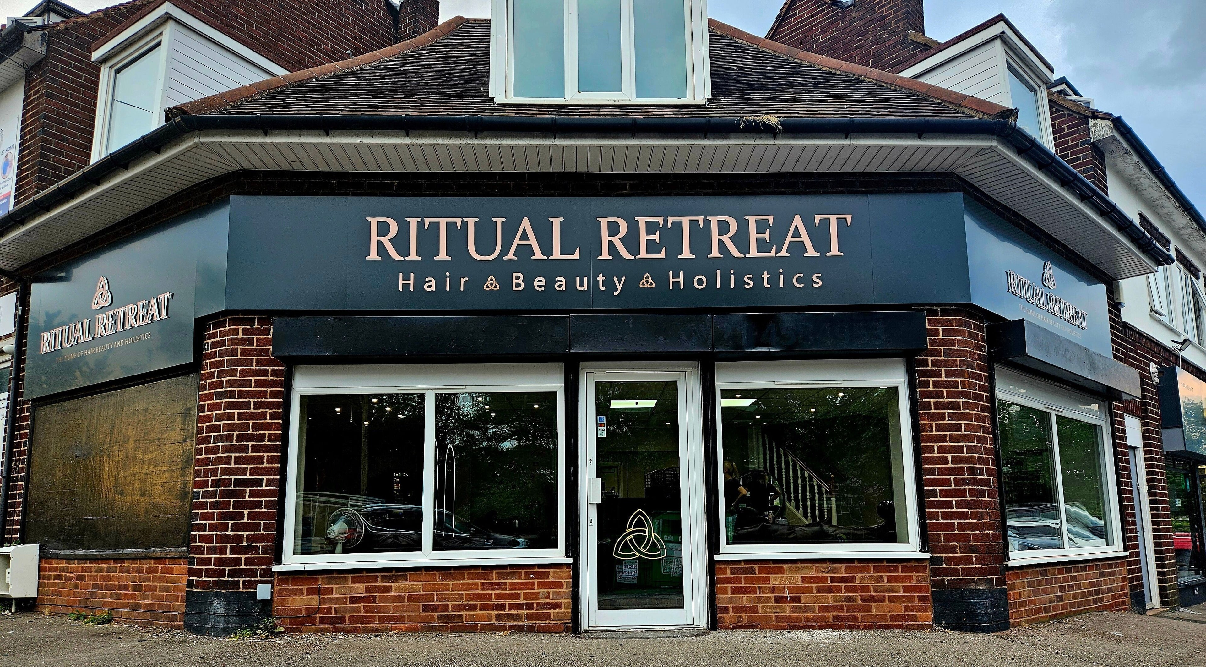 Ritual Retreat's stylish facade in Birmingham, England, GB, featuring hair, beauty and holistic services.