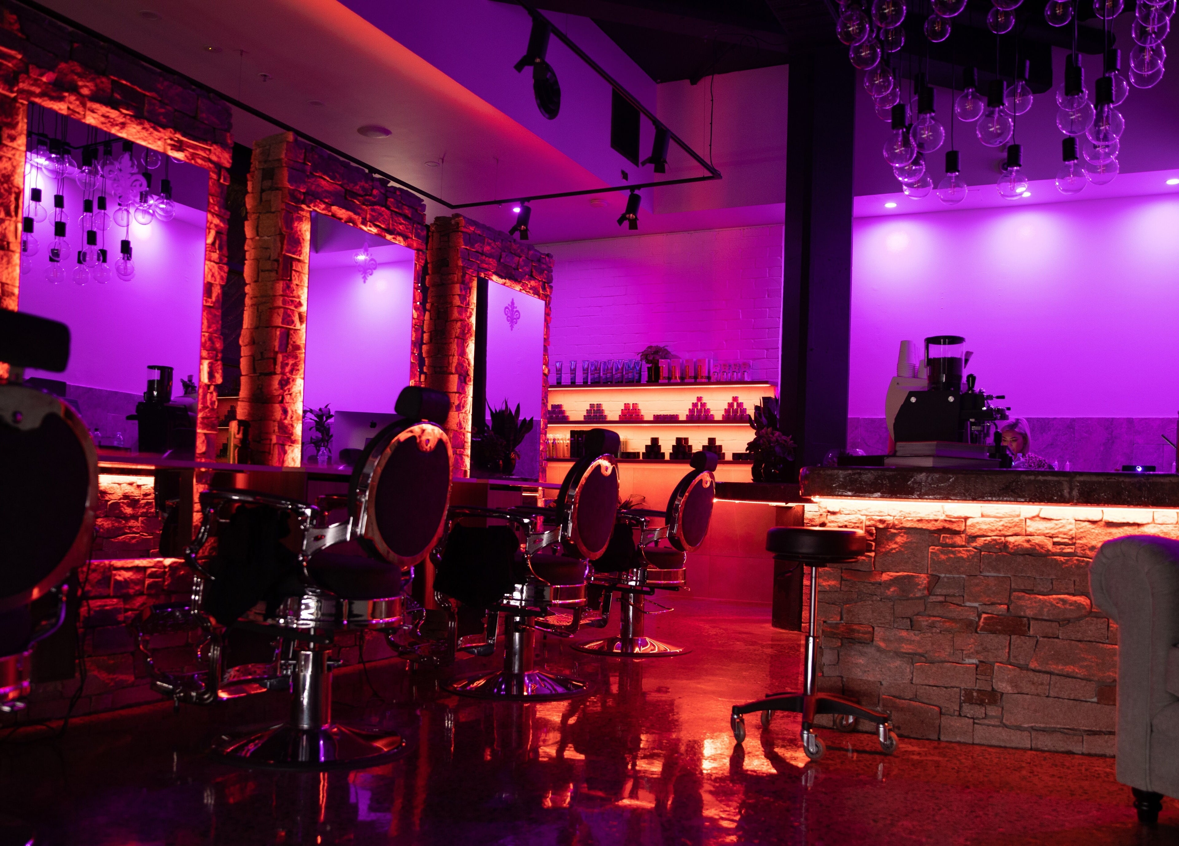 Langanis Studio's stylish interior with purple lighting in Teneriffe, Queensland, AU.