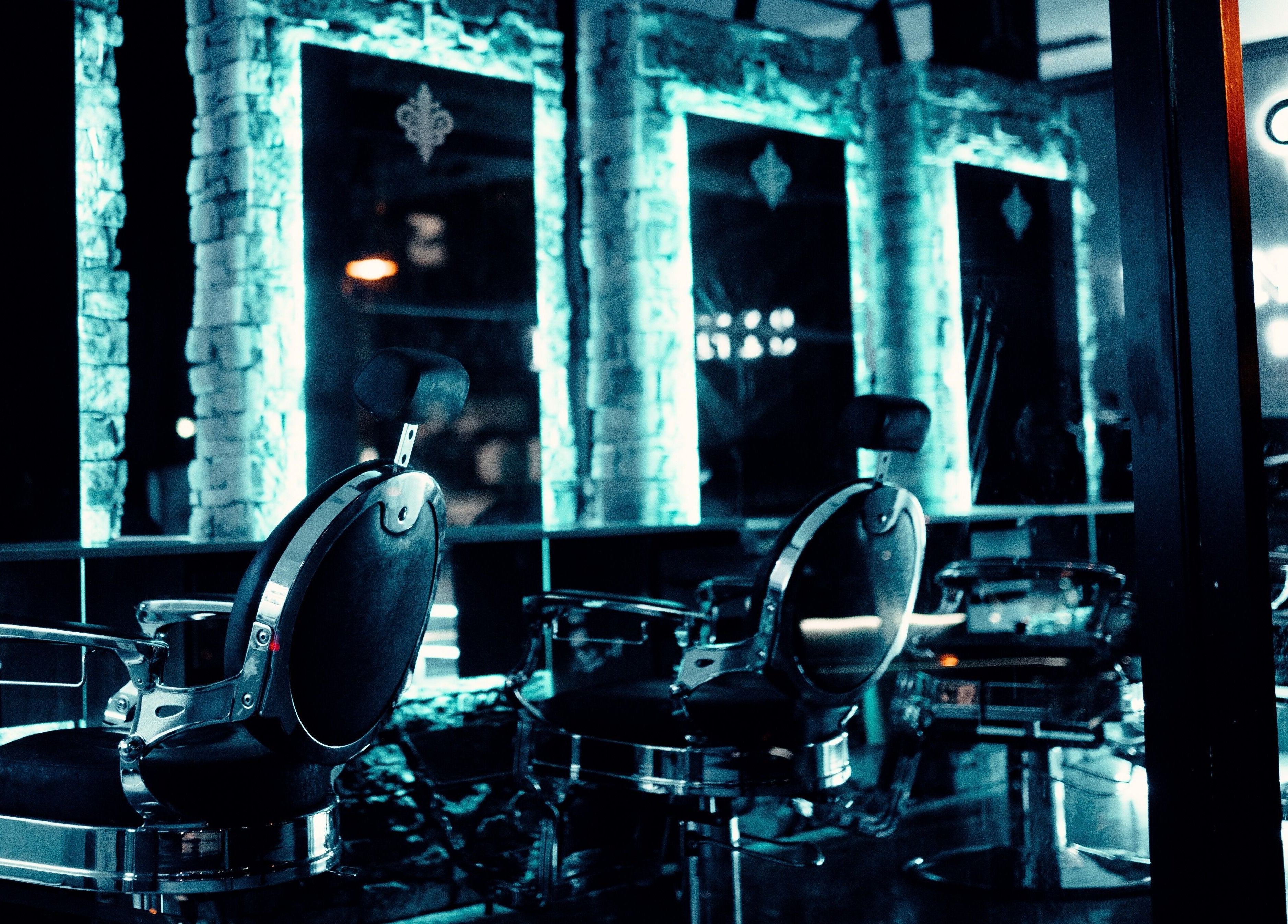 Stylish salon chairs at Langanis Studio, Teneriffe, Queensland, AU with ambient lighting.