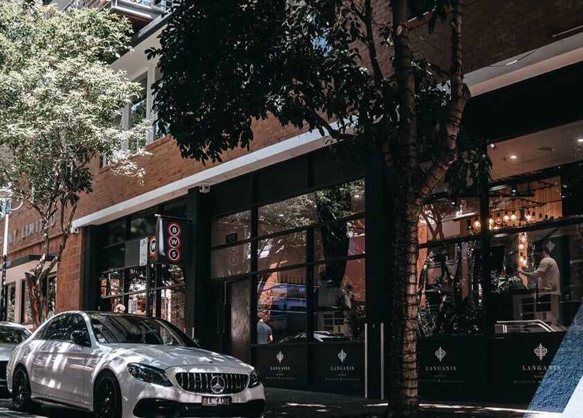 Langanis Studio exterior view with parked cars in Teneriffe, Queensland, AU.