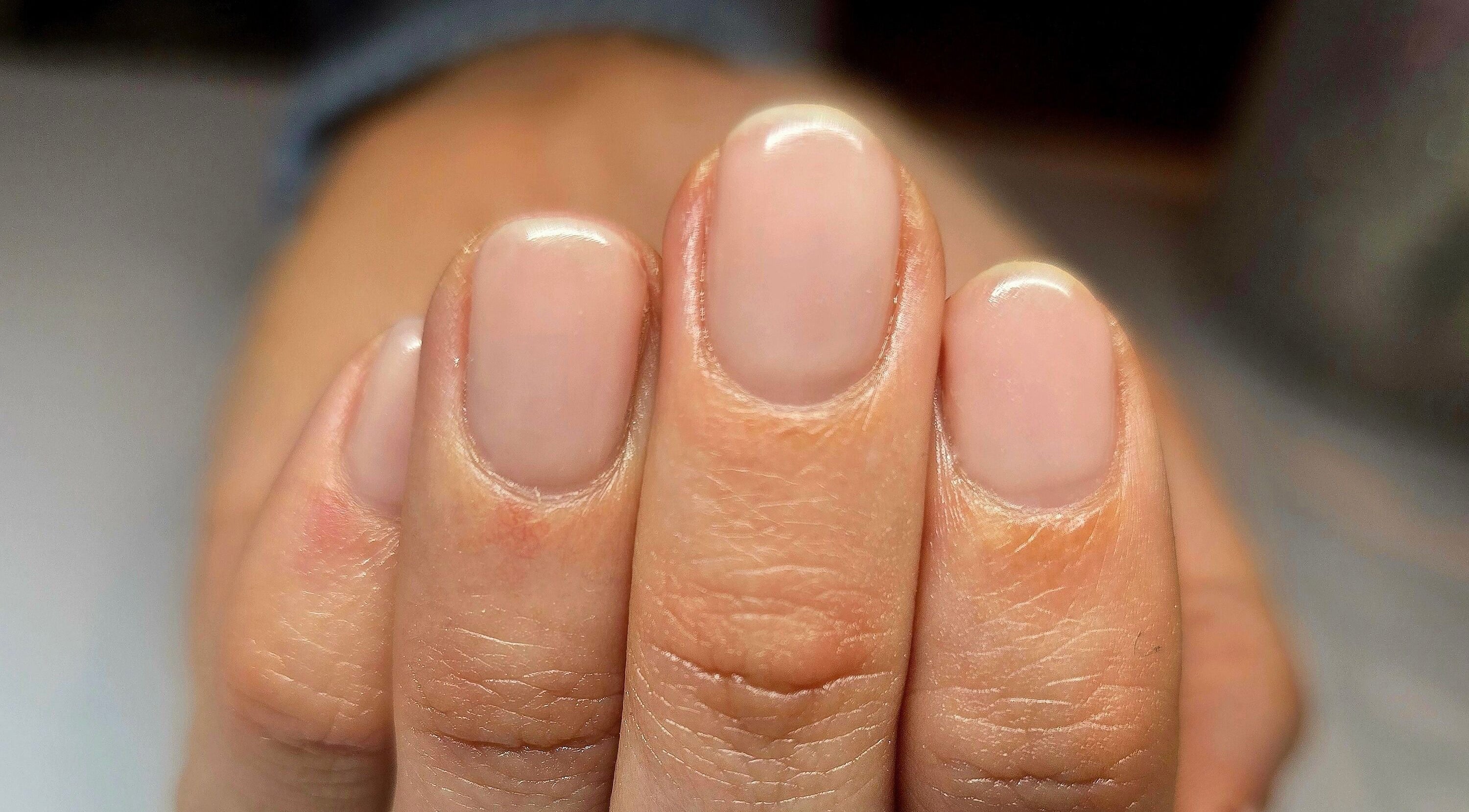 Freshly manicured nails at The Pamper Room, Cheadle, England, GB showcasing a natural shine.