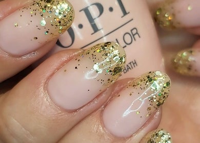 Stylish gold glitter nails at Hands & Heals by Tanya, Hamilton, Ontario, CA.