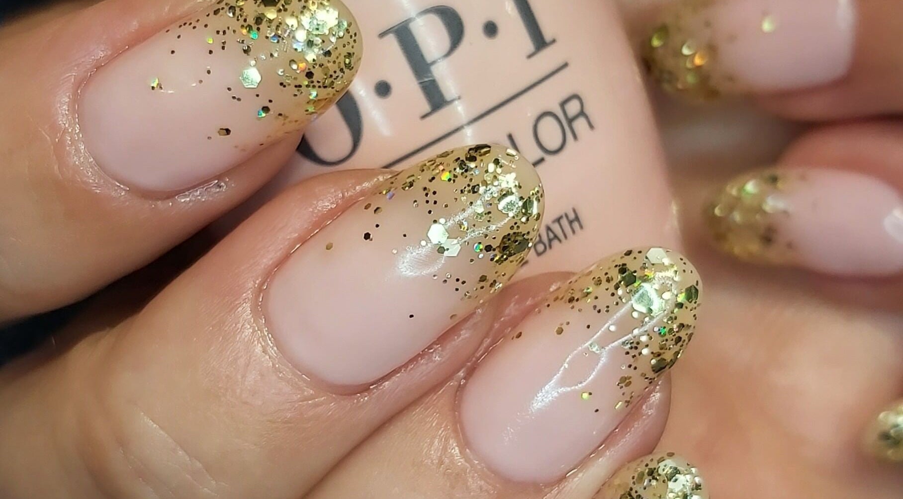 Stylish gold glitter nails at Hands & Heals by Tanya, Hamilton, Ontario, CA.