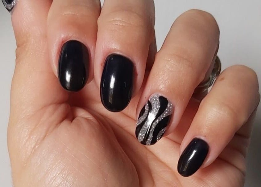Black nails with silver wave design at Hands & Heals by Tanya, Hamilton, Ontario, CA.
