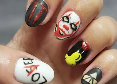 Creative nail art design at Hands & Heals by Tanya in Hamilton, Ontario, CA showcasing intricate patterns.