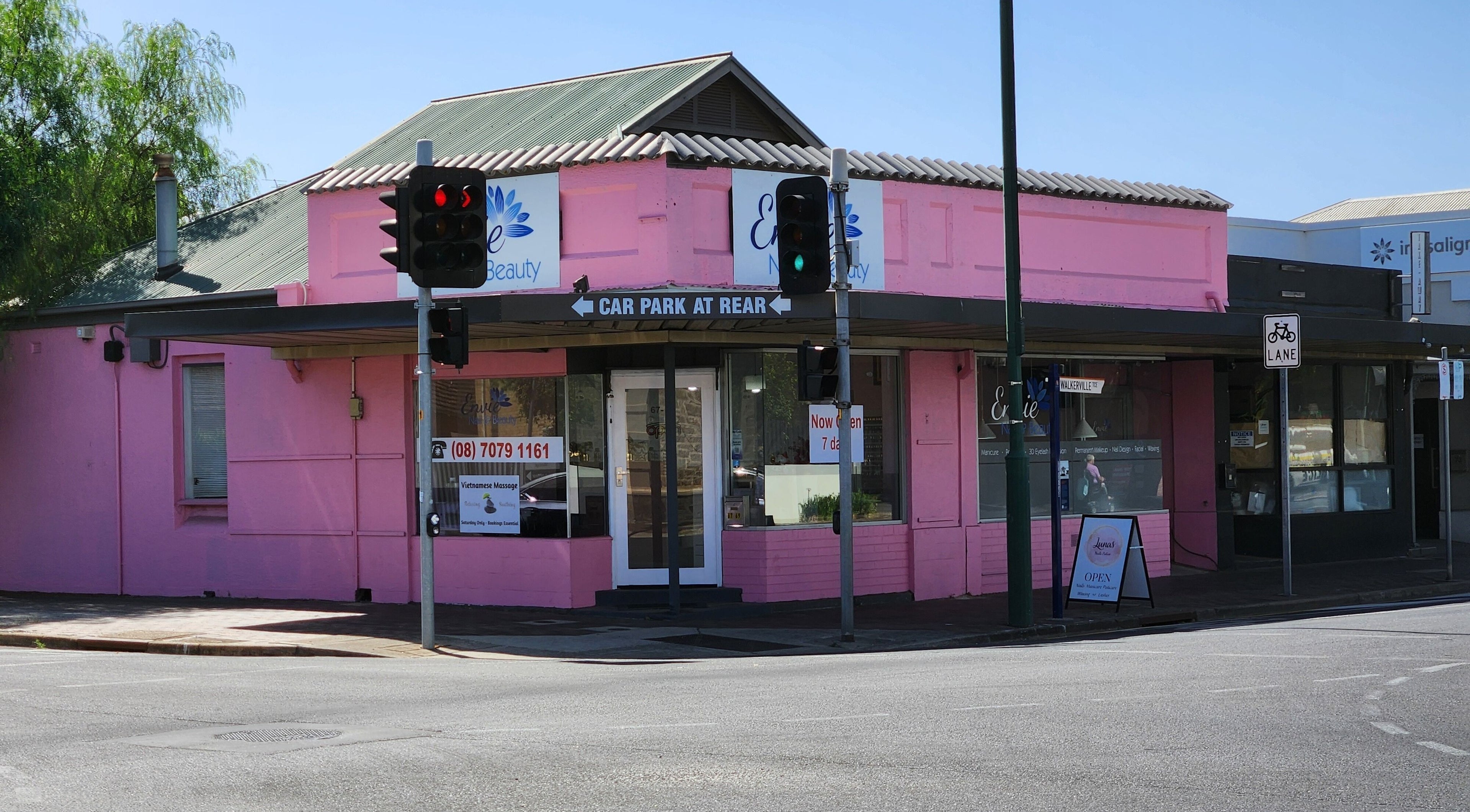 Exterior view of Lunas Nails Palace in Walkerville, South Australia, AU showcasing its vibrant pink facade.