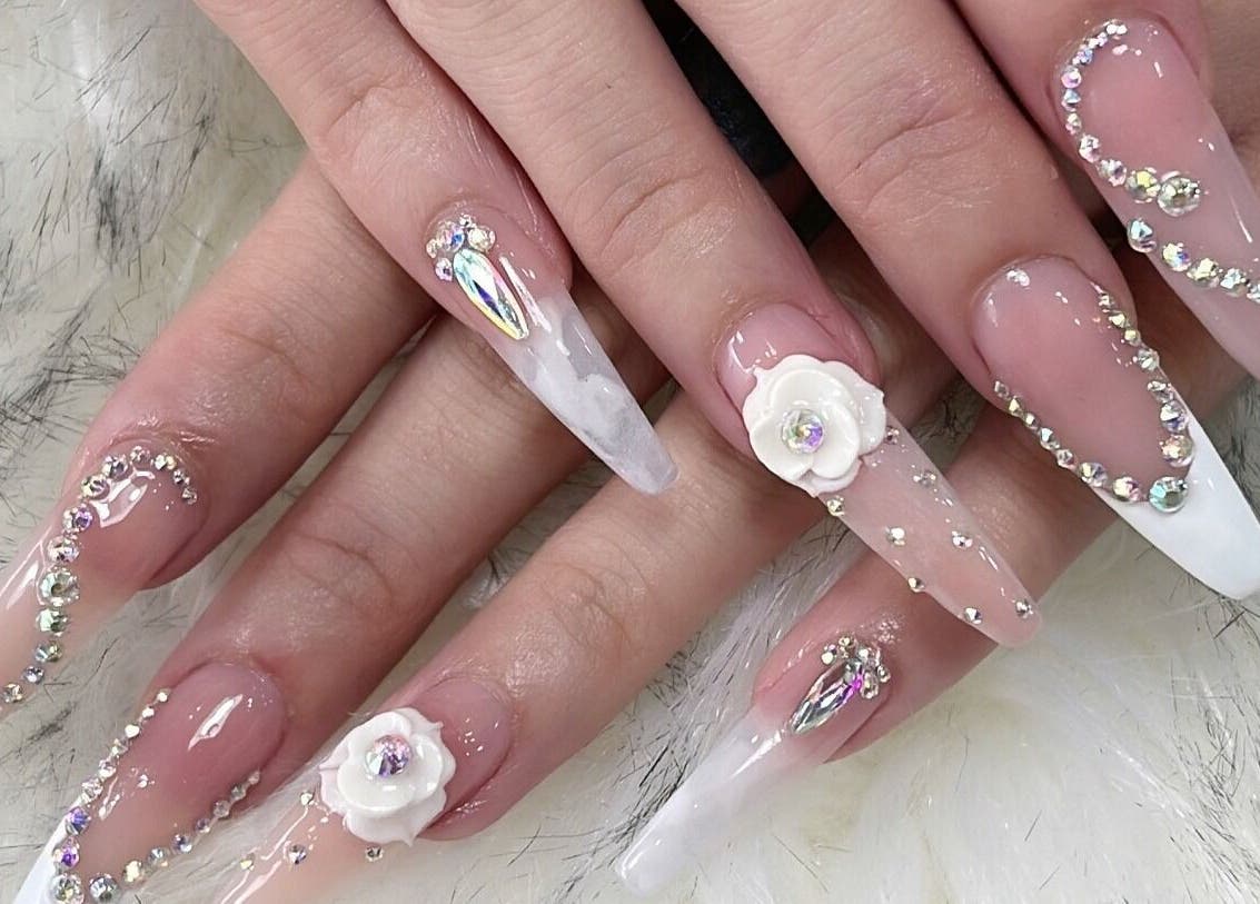 Intricately designed nails with rhinestones at Lunas Nails Palace, Walkerville, South Australia, AU.
