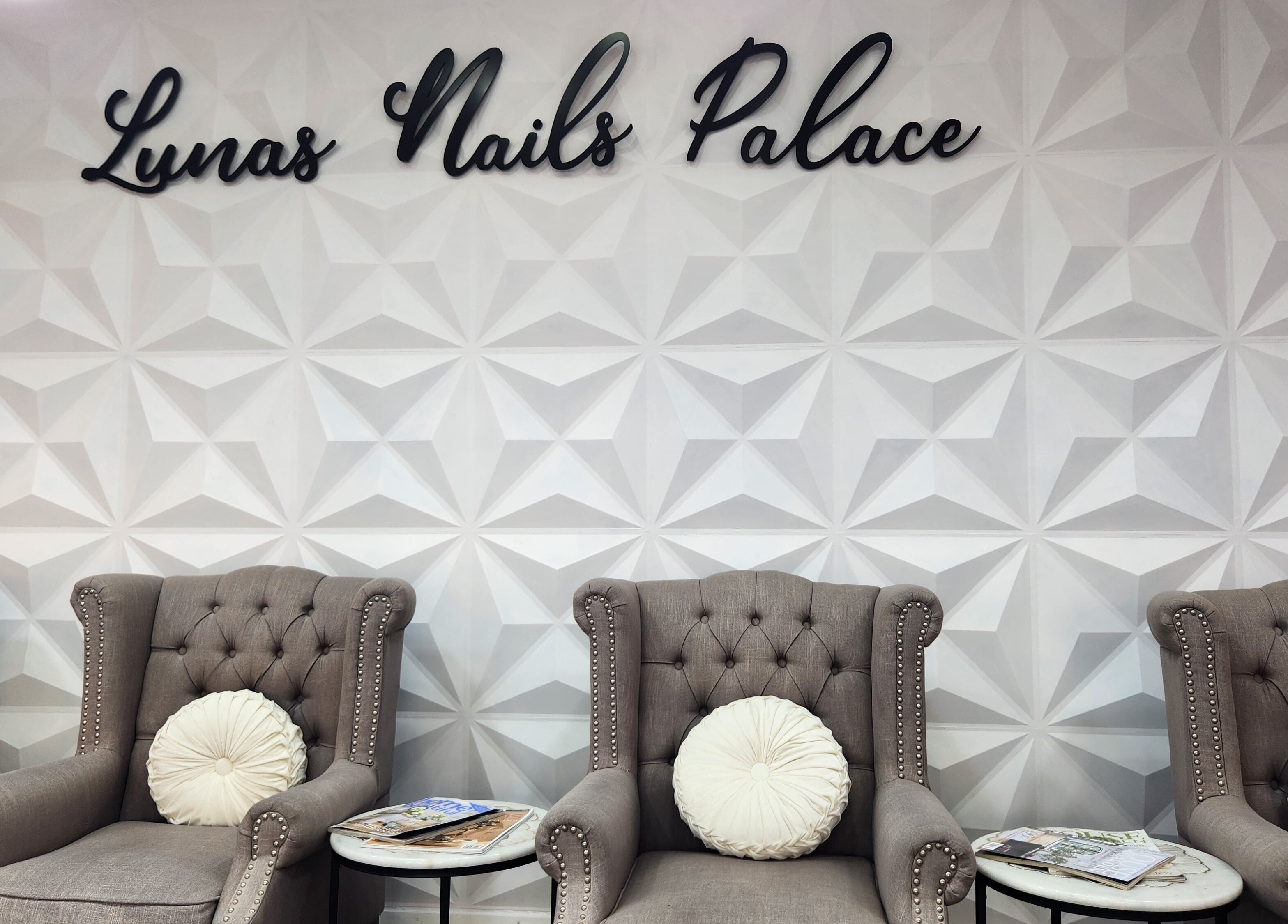 Luxurious seating area at Lunas Nails Palace in Walkerville, South Australia, AU, with plush chairs and decor.