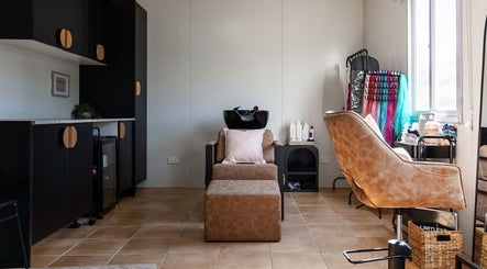 Modern salon interior at Hair By x Danielle in Glossodia, New South Wales, AU showcasing stylish design.