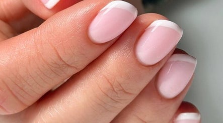 Elegant French manicure at ND Beauty Space, Hamilton, Ontario, CA, emphasizing subtle beauty and style.