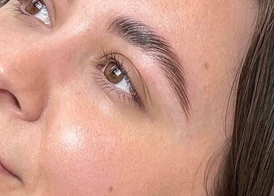 Close-up of radiant skin and perfectly shaped brows at ND Beauty Space, Hamilton, Ontario, CA.