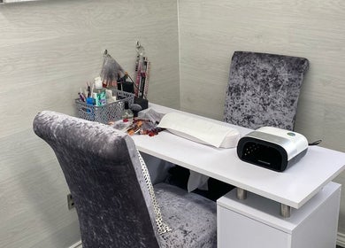 Chic nail station setup at Dee Beauty Salon, Eastleigh, England, GB, showcasing manicure essentials.