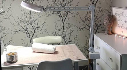 Cozy treatment area at Eclipse Aesthetic Centre, Bloemfontein, Free State, ZA with calming decor.