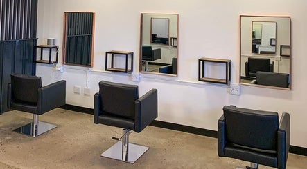 Modern salon chairs and mirrors at The Hair Company, Umhlanga, Kwazulu-natal, ZA.