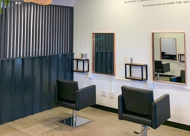 Modern salon chairs and mirrors at The Hair Company, Umhlanga, Kwazulu-natal, ZA.