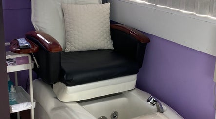 Luxurious pedicure chair at SugaZap Studio, Auckland, Auckland, NZ, with a cozy pillow and spa basin.