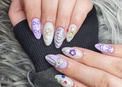 Stylish nail art with bows and gems at Five Star Nails Aesthetic-Silverdale, Auckland, Auckland, NZ.