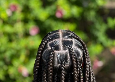 Detailed braids at SlayedbyKy, Brighton, St. George, VC, showcasing expert hairstyling.