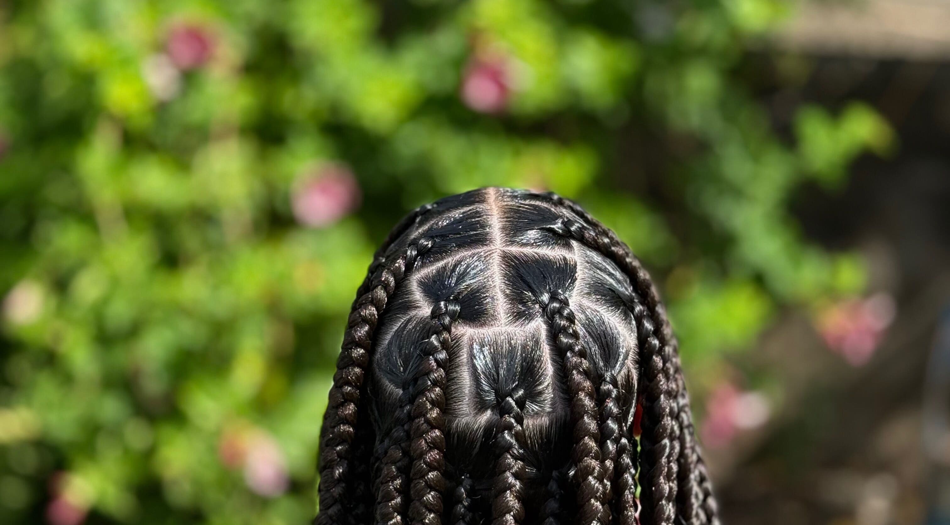 Detailed braids at SlayedbyKy, Brighton, St. George, VC, showcasing expert hairstyling.