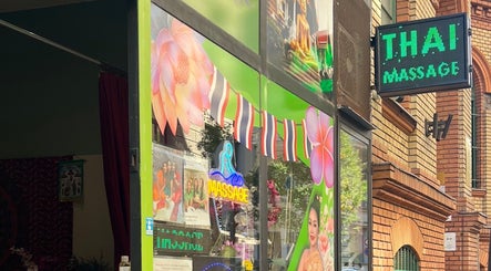 Entrance of Mint Thai Massage shop2 - Irányi utca 5, Budapest, showcasing vibrant signage and decor.