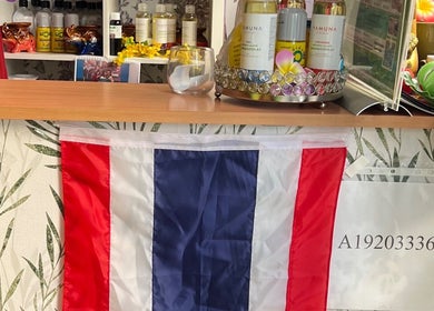 Reception decor at Mint Thai Massage shop2 - Irányi utca 5, Budapest, Magyar, HU, showcasing oils and Thai flag.