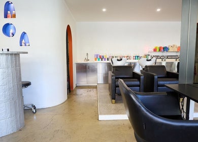 Modern salon interior at Chad Wij, Newtown, New South Wales, AU, featuring chic design and stylish seating.