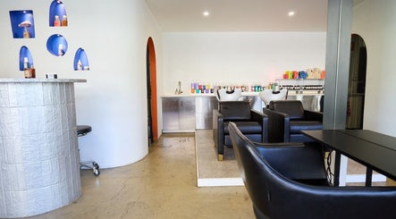 Modern salon interior at Chad Wij, Newtown, New South Wales, AU, featuring chic design and stylish seating.