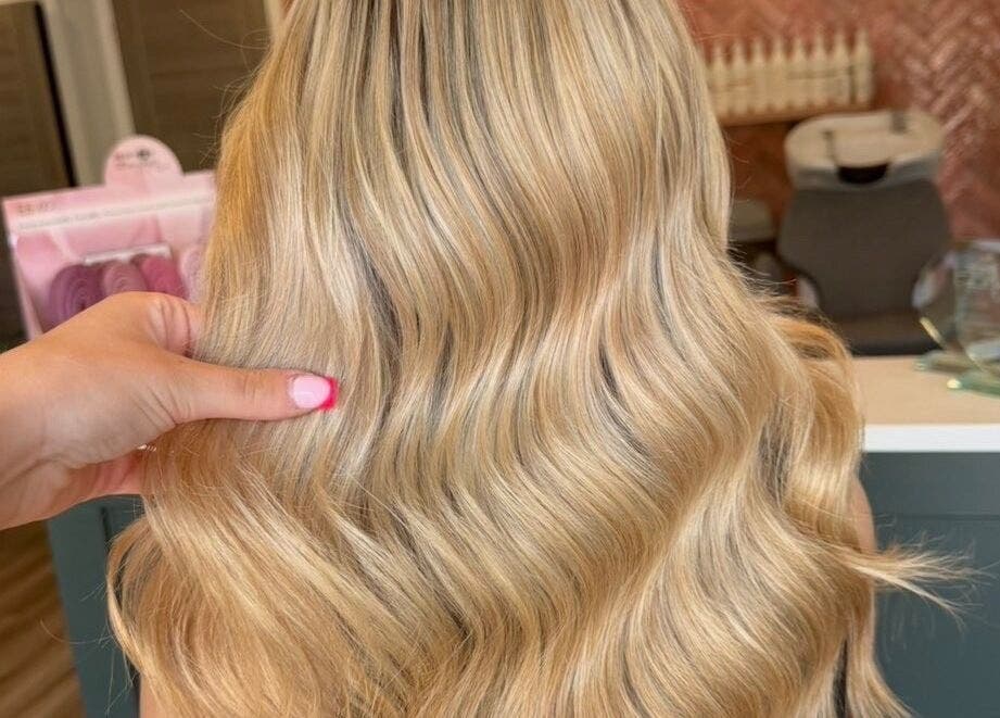 Blonde hair styled with waves at STUDIO 68 Hair & Nails, Portsmouth, England, GB.
