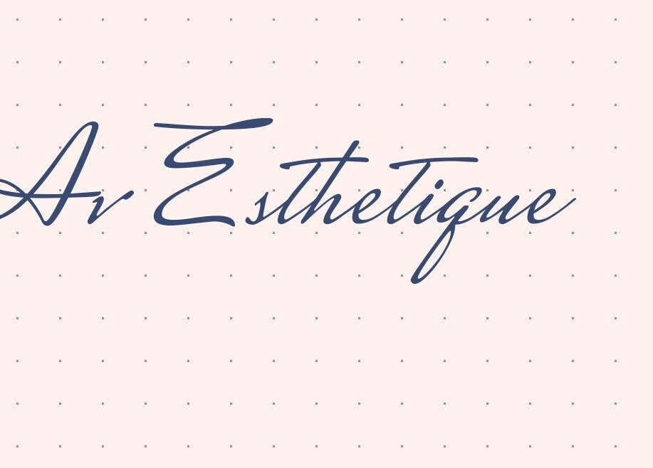 Elegant script logo of Ashley Esthétique in Sainte-thérèse, Quebec, CA on a soft pink background.