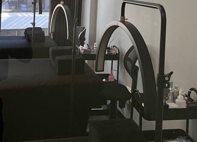 Treatment beds and lights at Afia Beauty Studio, Randburg, Gauteng, ZA, perfect for relaxing wellness.