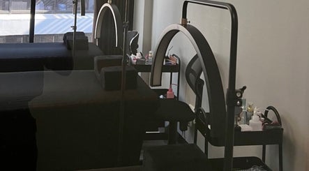 Treatment beds and lights at Afia Beauty Studio, Randburg, Gauteng, ZA, perfect for relaxing wellness.