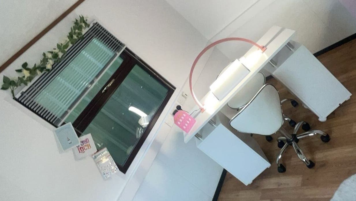 Modern nail station at Nailsby LeahtT in Bellaghy, Northern Ireland, GB with white decor and natural light.