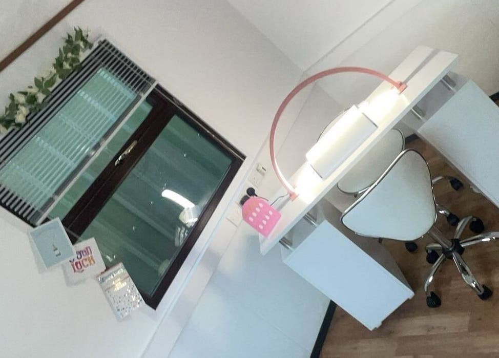 Modern nail station at Nailsby LeahtT in Bellaghy, Northern Ireland, GB with white decor and natural light.