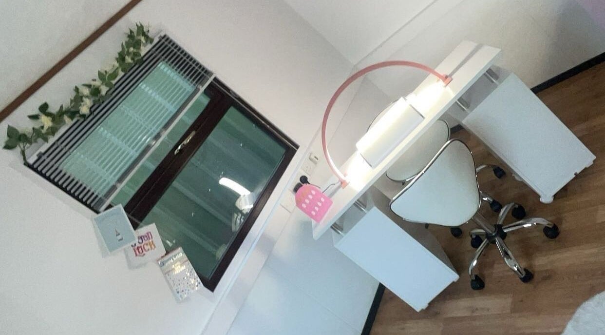 Modern nail station at Nailsby LeahtT in Bellaghy, Northern Ireland, GB with white decor and natural light.