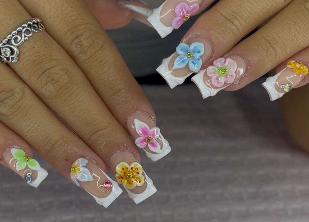 Elegant floral nail art at NailsbyLeahtT in Bellaghy, Northern Ireland, GB showcasing intricate 3D designs.