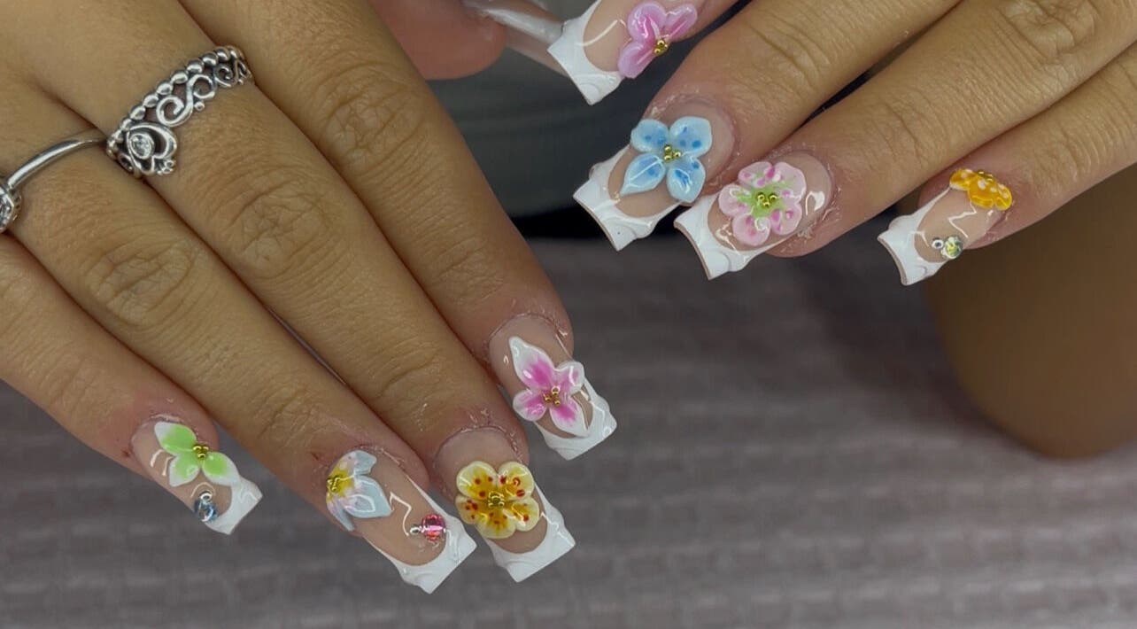 Elegant floral nail art at NailsbyLeahtT in Bellaghy, Northern Ireland, GB showcasing intricate 3D designs.