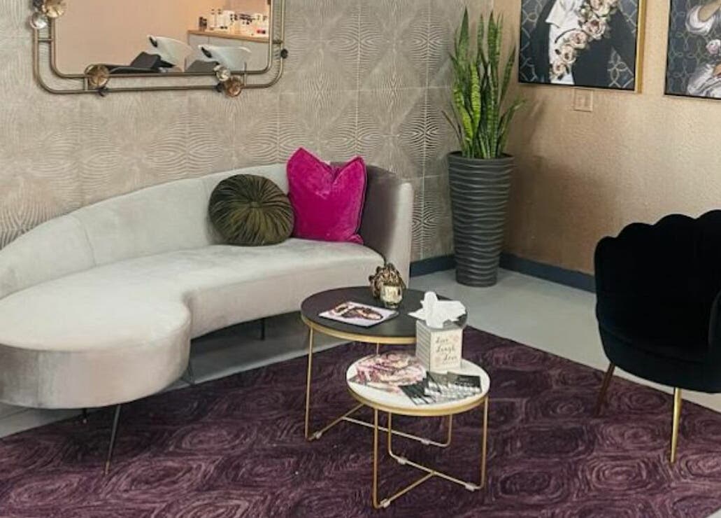 Stylish lounge at Boudoir hair concepts, Plano, Texas, US, featuring chic decor and plush seating.